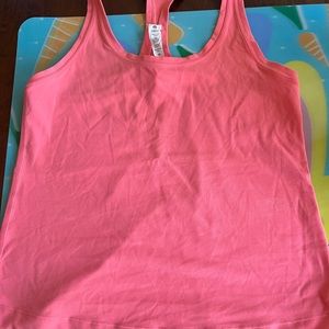 Raspberry cream Lululemon tank.